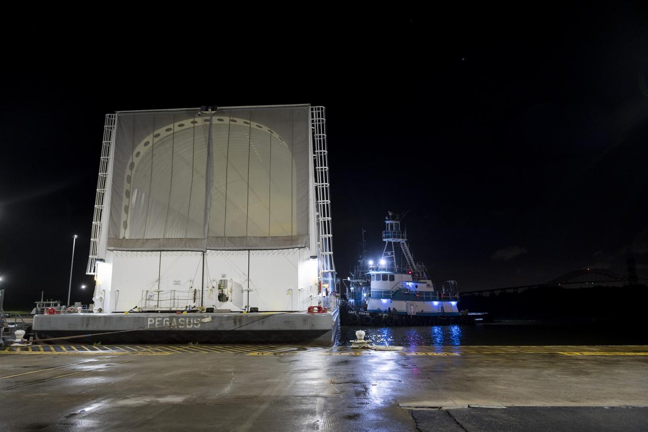 These images show NASA’s Pegasus barge at NASA’s Michoud Assembly Facility in New Orleans as it transported the Artemis I launch vehicle stage adapter (LVSA) of the agency’s Space Launch System rocket to NASA’s Kennedy Space Center in Florida. Leaving with the adapter from NASA’s Marshall Space Flight Center in Huntsville, Alabama, Pegasus made a brief stop at Michoud to offload supplies and equipment before continuing its to Kennedy. The LVSA connects the deep space rocket’s 212-foot-tall core stage to the rocket’s upper stage and will be used for Artemis I, the first in a series of increasingly complex missions to the Moon through NASA’s Artemis program. Once at Kennedy, the LVSA will undergo Artemis I launch preparations. Only the SLS core stage, currently in final testing at NASA’s Stennis Space Center near Bay St. Louis, Mississippi, remains to be shipped to Kennedy on Pegasus. The core stage is produced at Michoud. Together with four RS-25 engines, the rocket’s massive 212-foot-tall core stage — the largest stage NASA has ever built — and its twin solid rocket boosters produce 8.8 million pounds of thrust to send NASA’s Orion spacecraft, astronauts and supplies beyond Earth’s orbit to the Moon. Offering more payload mass, volume capacity and energy to speed missions through space, the SLS rocket, along with NASA’s Gateway in lunar orbit, the Human Landing System and Orion, is part of NASA’s backbone for deep space exploration and the Artemis lunar program. No other rocket is capable of carrying astronauts in Orion around the Moon in a single mission.